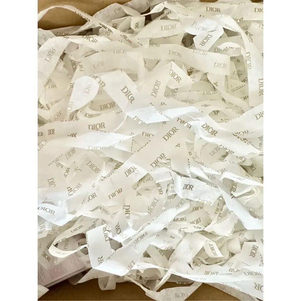 Handful of Dior shredded tissue paper ￼